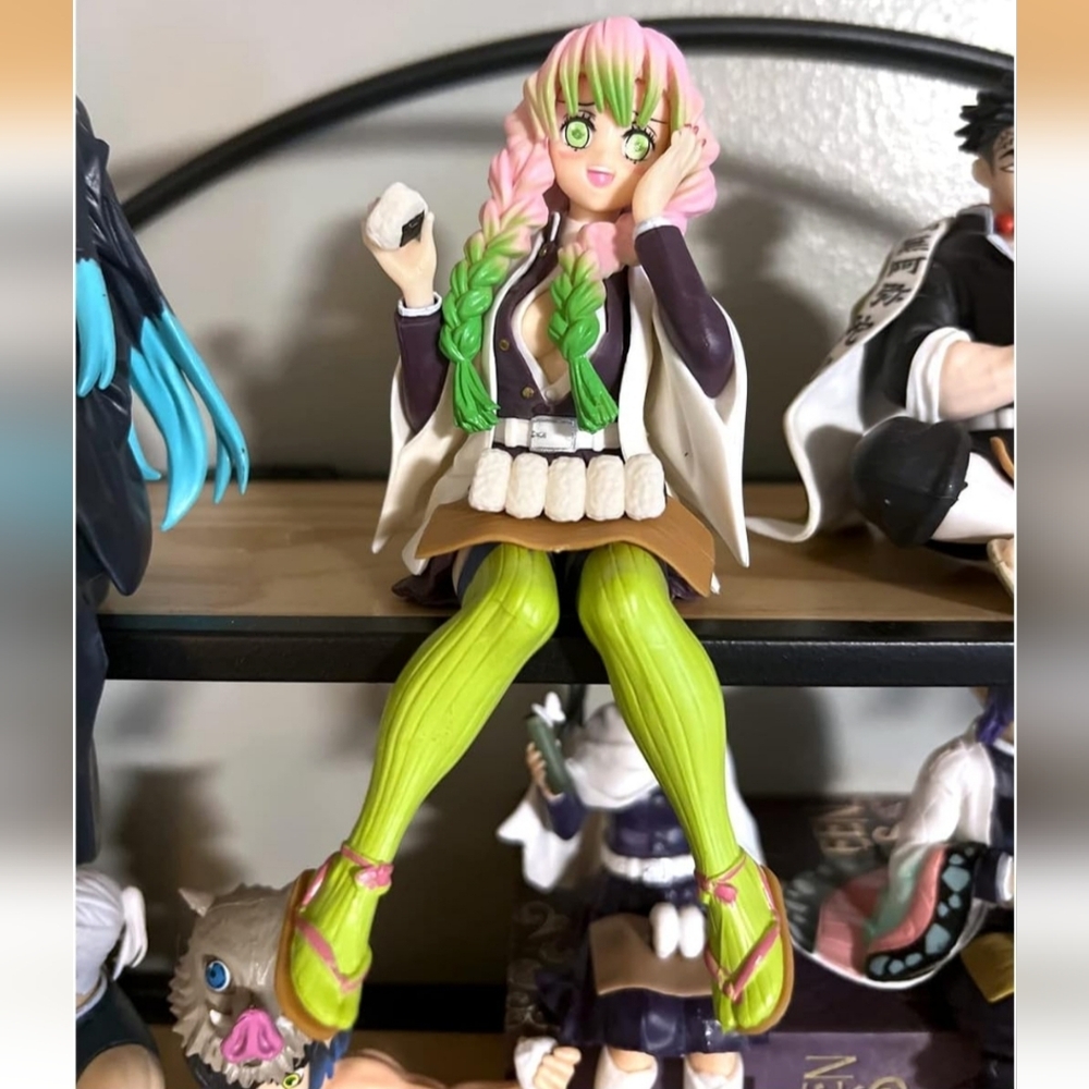 Vibrant Anime Figurine with Green and Pink Hair
